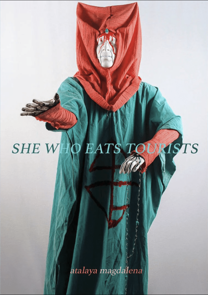 she who eats tourists by atalaya magdalena has a weird cultish figure in turquoise and red robes with evil red paint all over their face