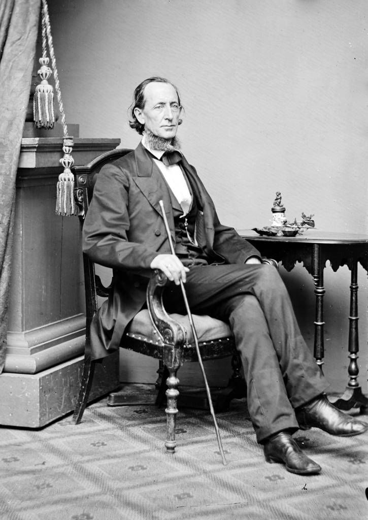 A.O.P. Nicholson, a man who looks like he crawled out of a B-tier vampire flick and forgot to drink his daily blood