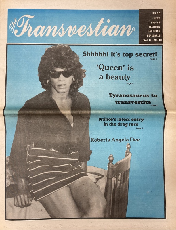 Dee's cover shoot for the The Transvestian in 1993, featuring Dee in a sharp black top and a white and black striped skirt with sunglasses, staring haughtily at the reader.